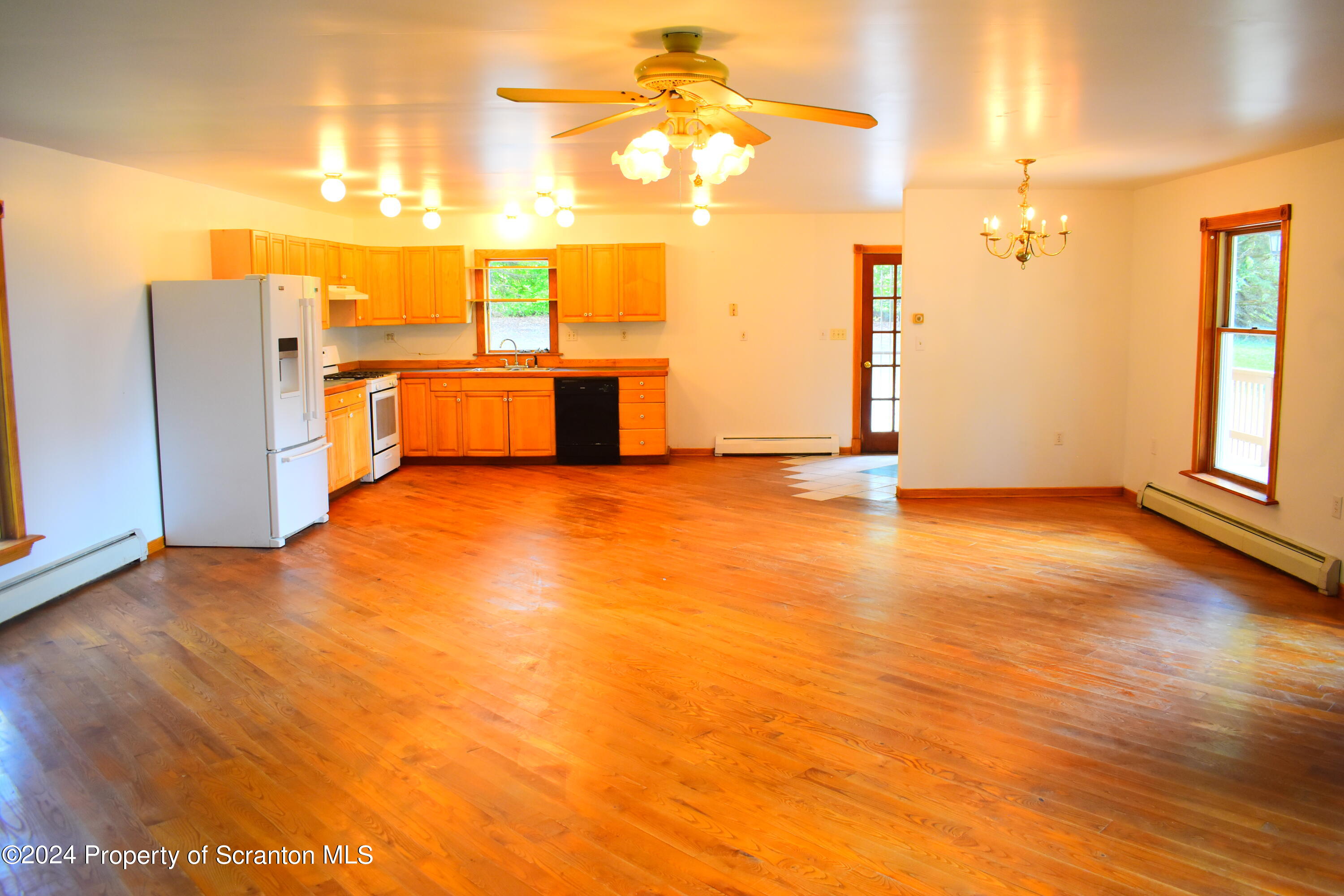 7678 State Rte 3023 Montrose, PA 18801 - Photo 9 of 29 a view of a room with garage and wooden floors