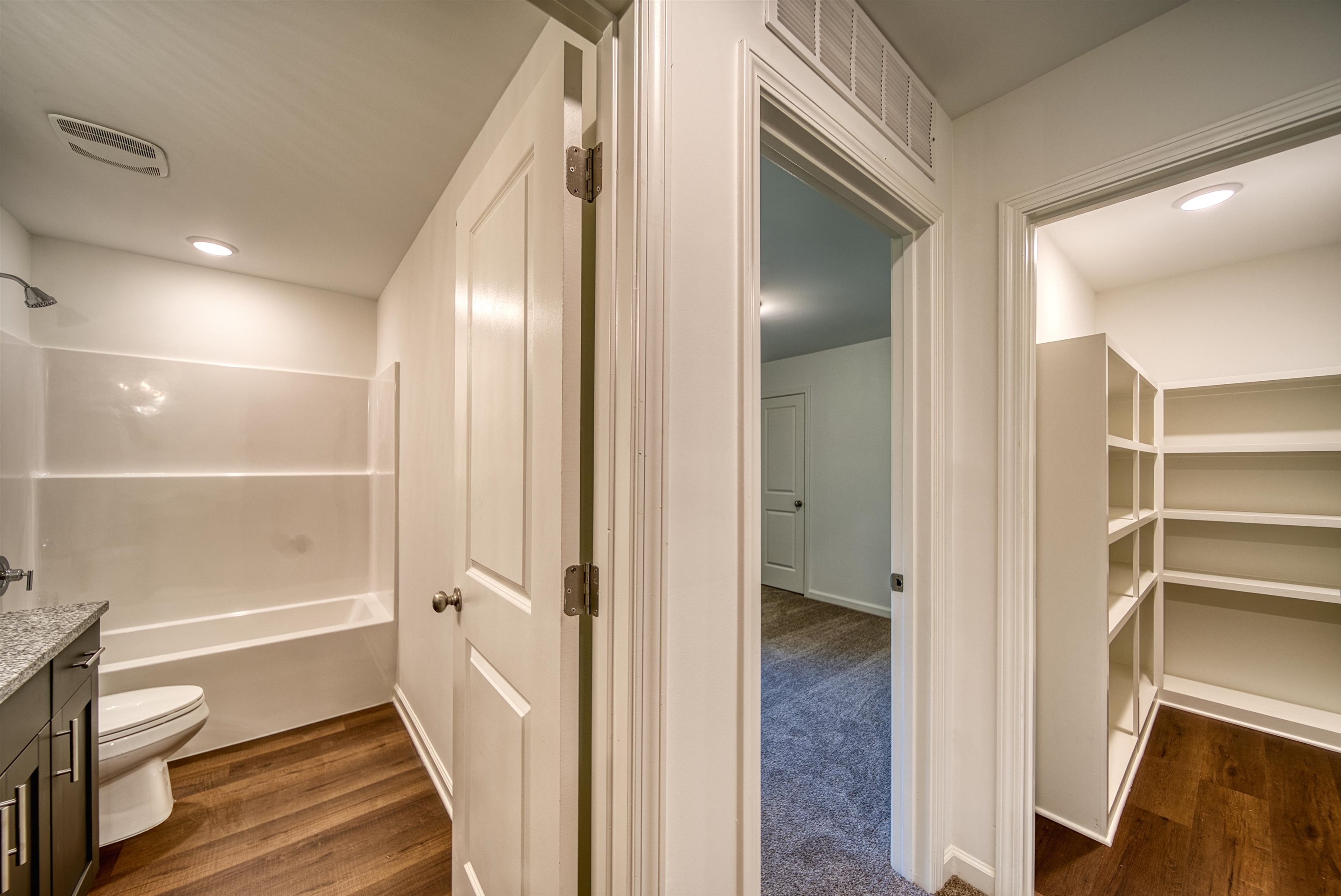 108 Walnut Ridge Ripley, TN 38063 - Photo 11 of 35 a bathroom with a glass door shower a toilet and a sink