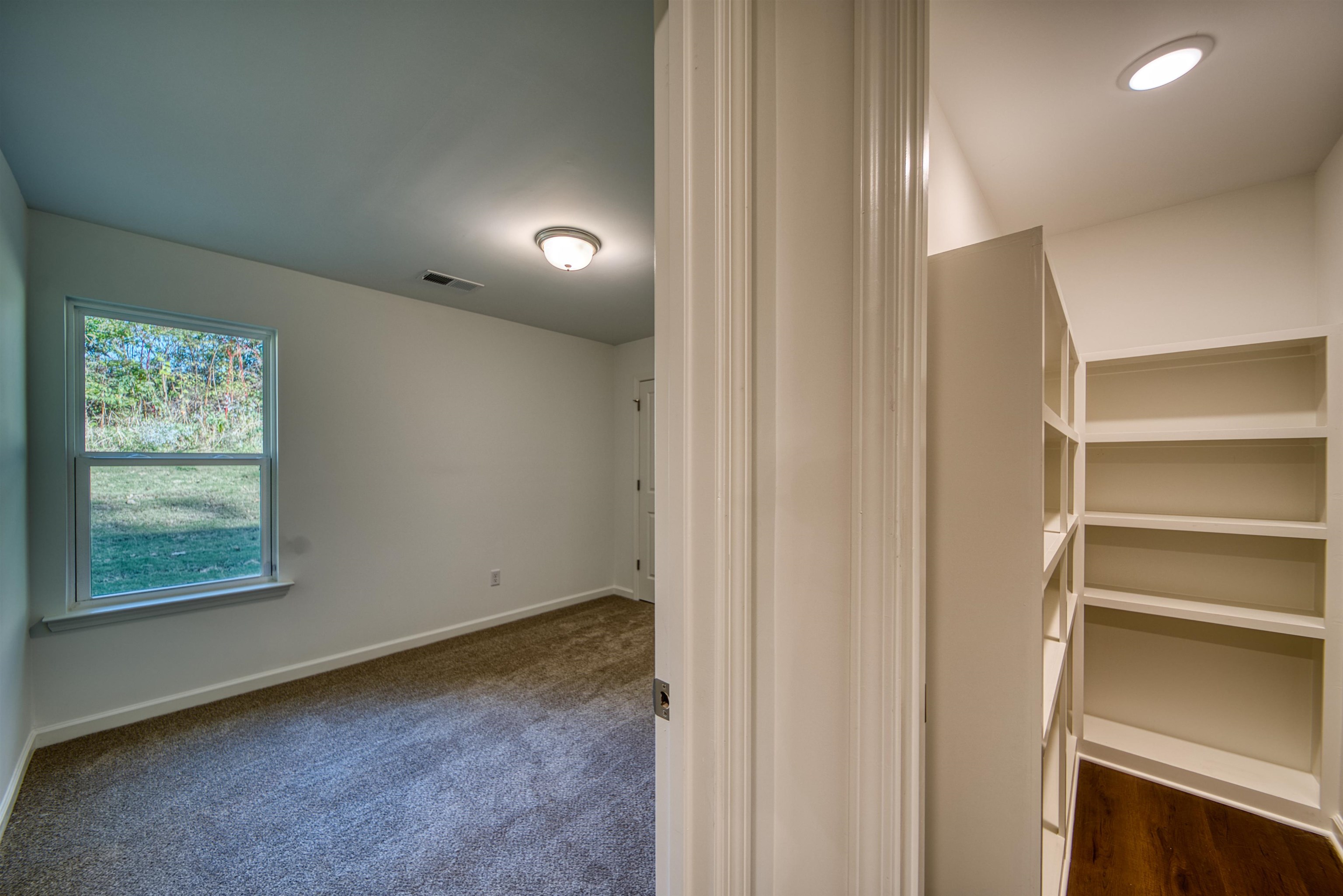 108 Walnut Ridge Ripley, TN 38063 - Photo 13 of 35 a view of an empty room with a window