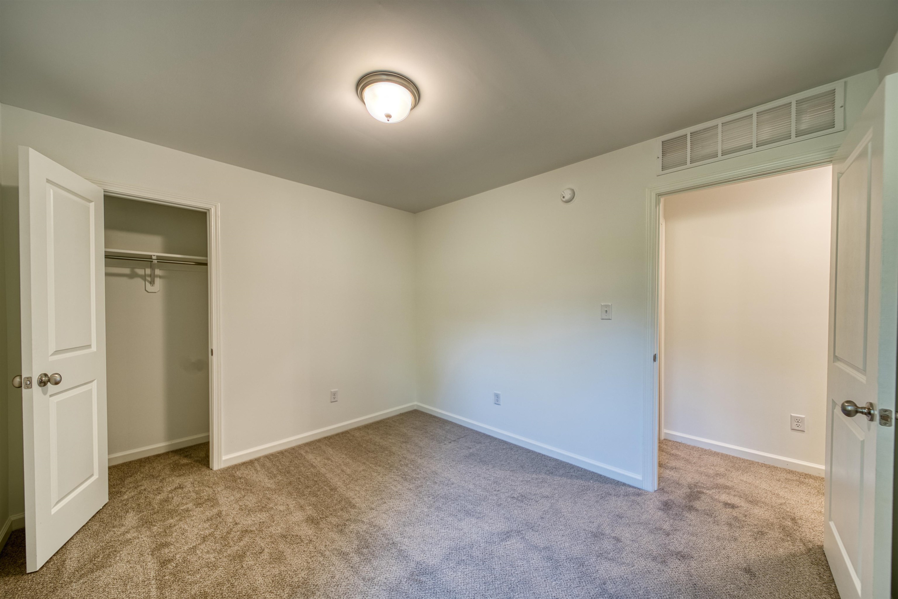 108 Walnut Ridge Ripley, TN 38063 - Photo 15 of 35 Unfurnished bedroom featuring light colored carpet and a closet