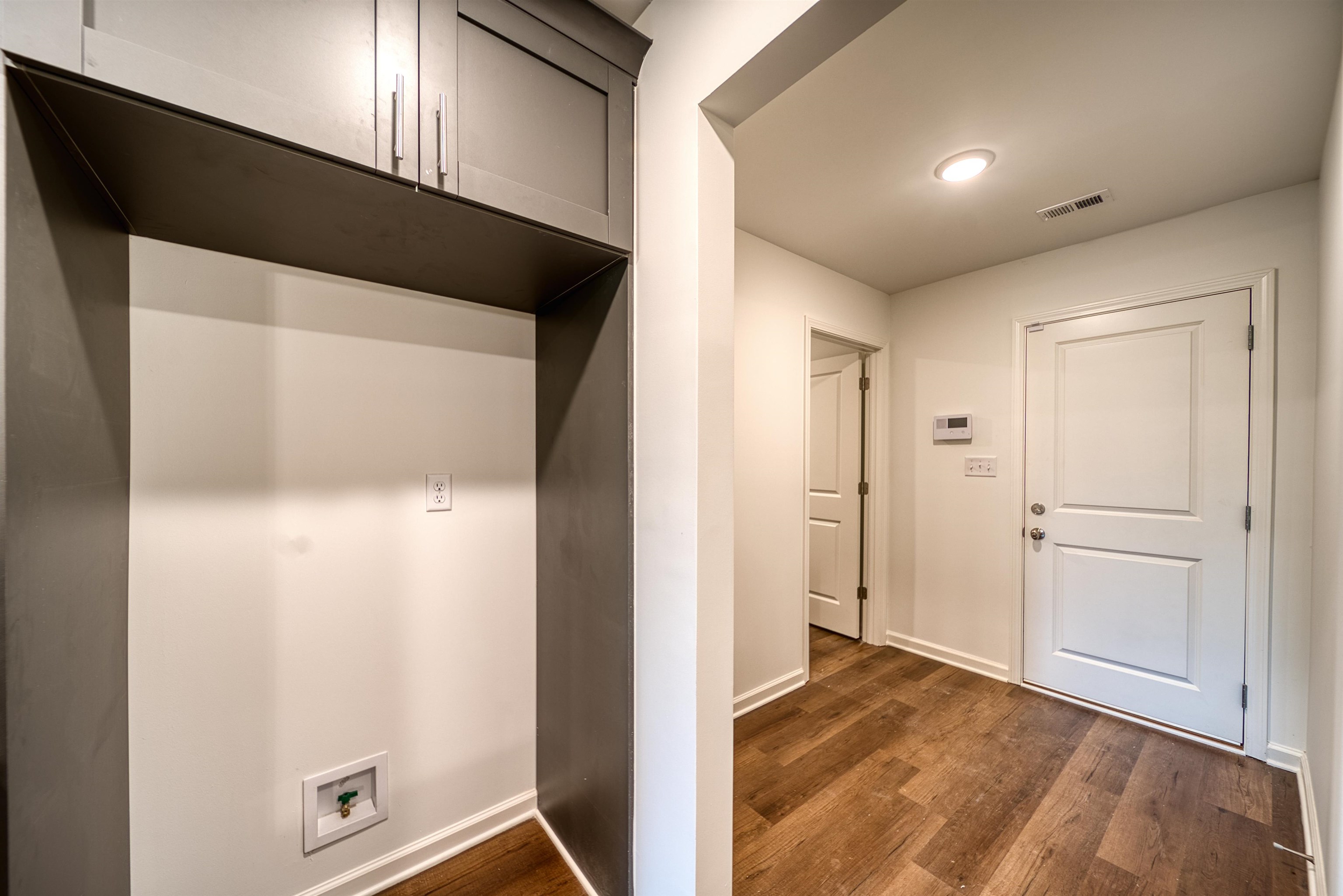 108 Walnut Ridge Ripley, TN 38063 - Photo 18 of 35 Mudroom with dark wood-style floors and baseboards