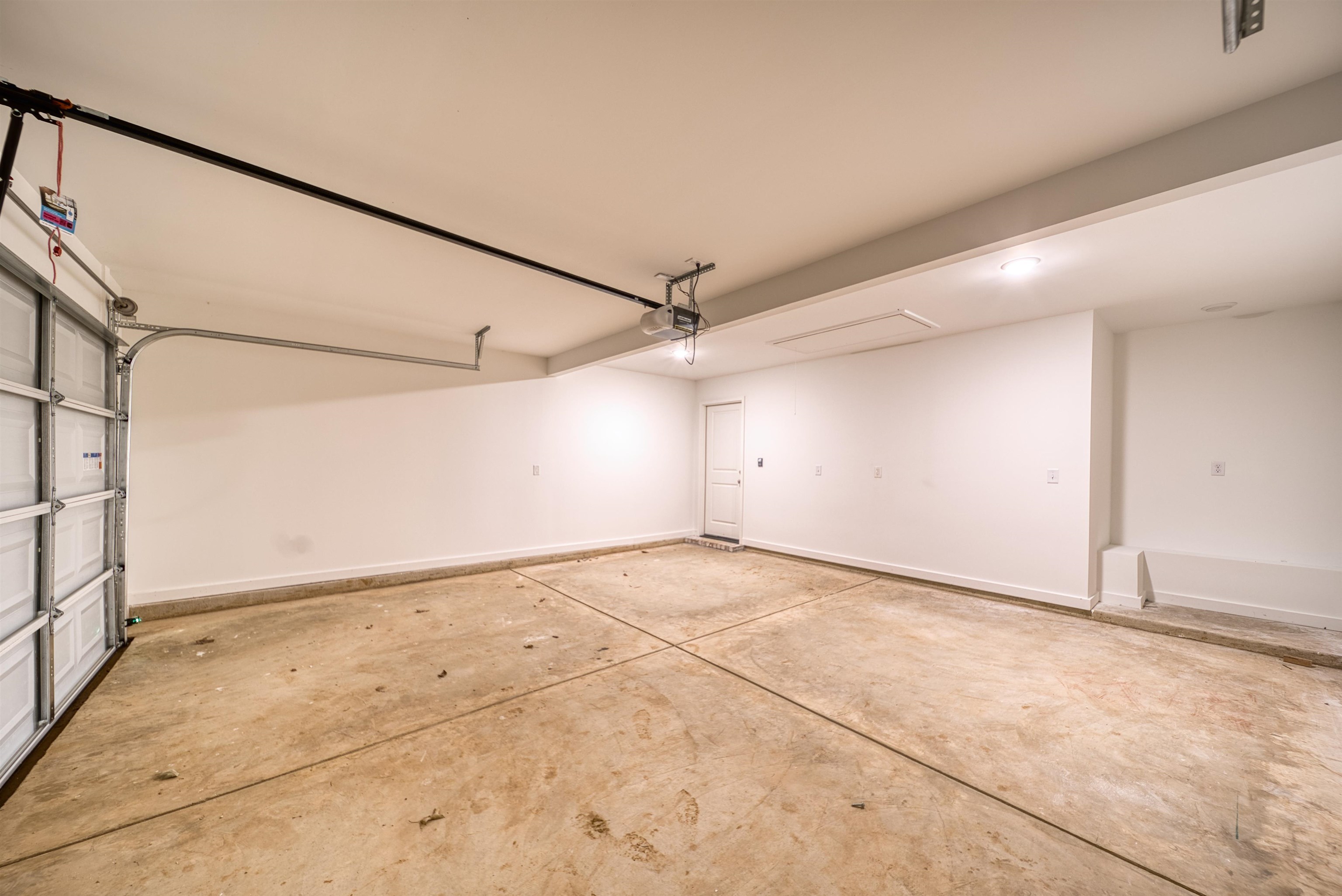 108 Walnut Ridge Ripley, TN 38063 - Photo 24 of 35 Garage featuring baseboards