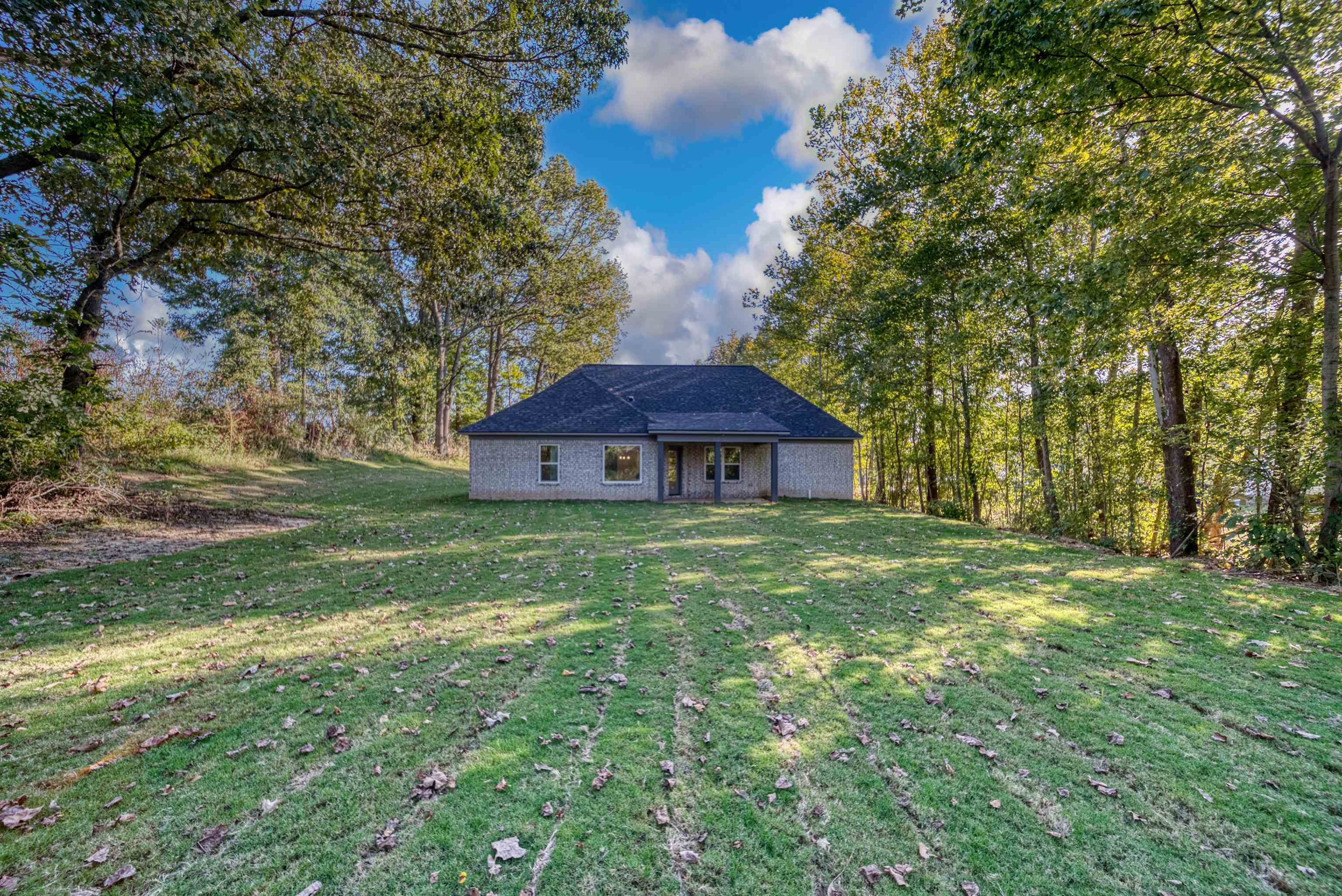 108 Walnut Ridge Ripley, TN 38063 - Photo 29 of 35 a view of a house with a yard