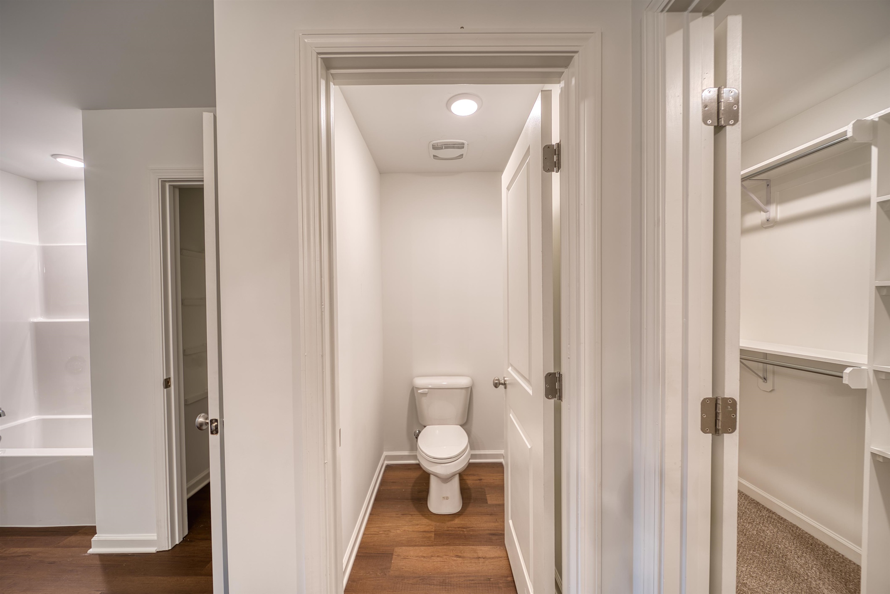 108 Walnut Ridge Ripley, TN 38063 - Photo 6 of 35 Full bath featuring a walk in closet and dark wood finished floors