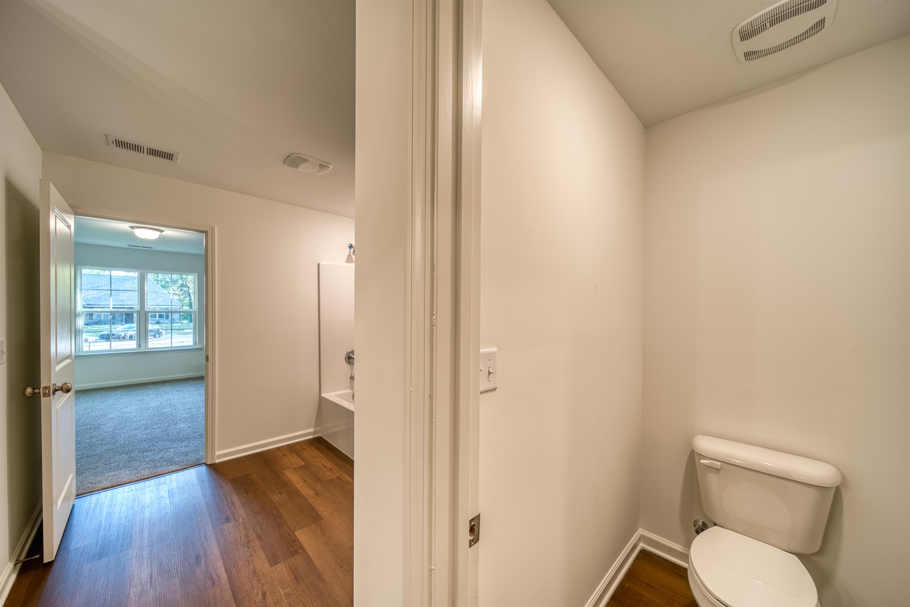 108 Walnut Ridge Ripley, TN 38063 - Photo 8 of 35 a bathroom with a toilet and a shower