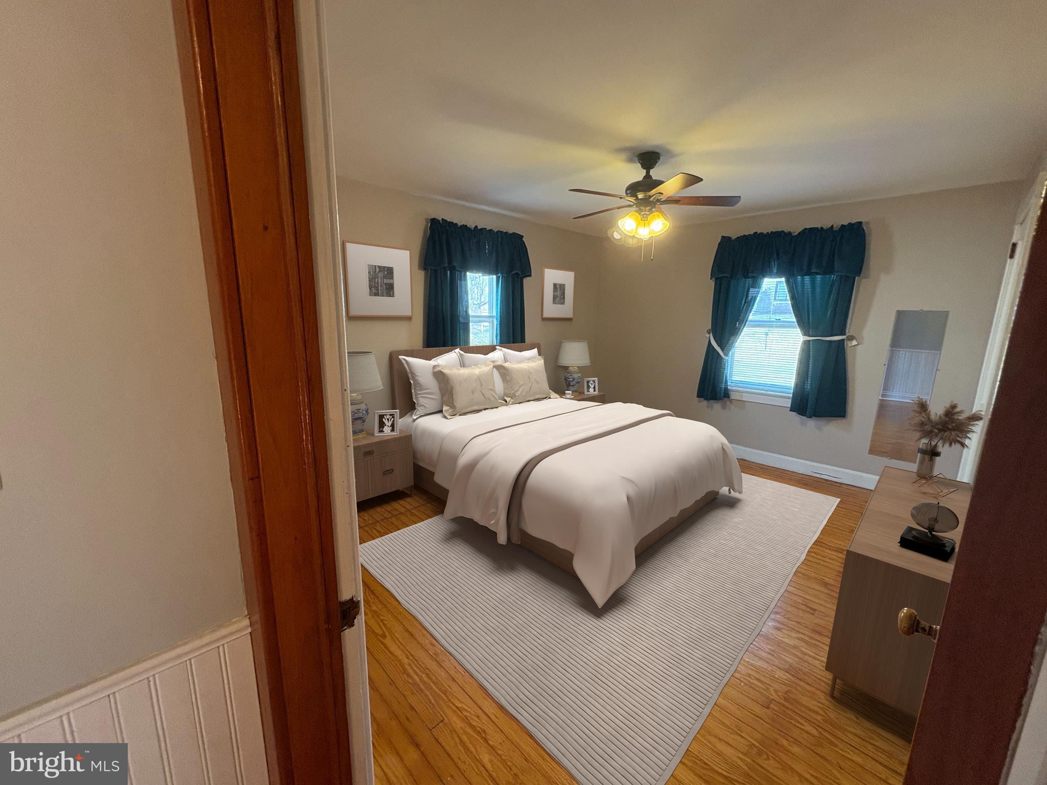 424 Lampeter Road Lancaster, PA 17602 - Photo 15 of 41 a bedroom with a bed and a chandelier