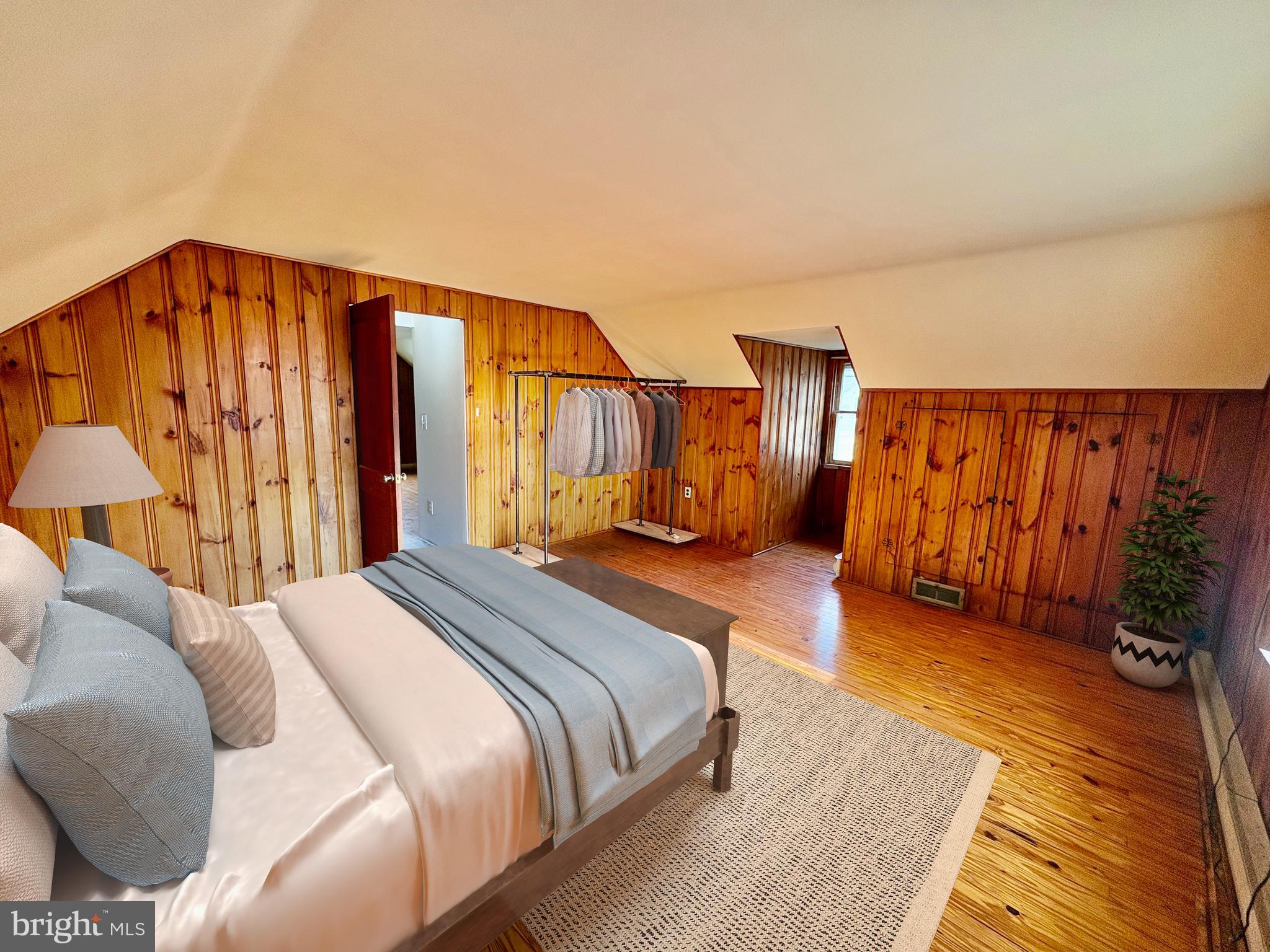 424 Lampeter Road Lancaster, PA 17602 - Photo 22 of 41 a spacious bedroom with a bed and a walk in closet