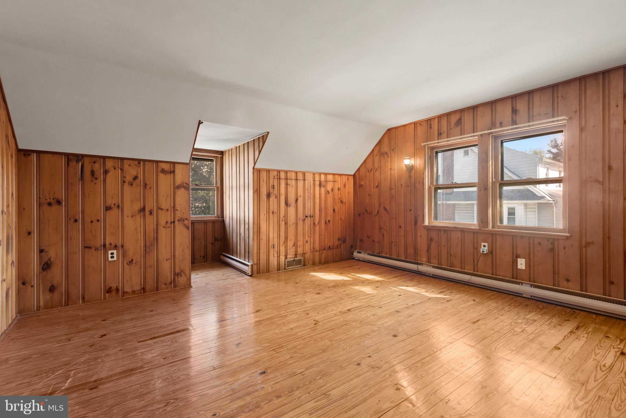424 Lampeter Road Lancaster, PA 17602 - Photo 24 of 41 an empty room with wooden floor and windows