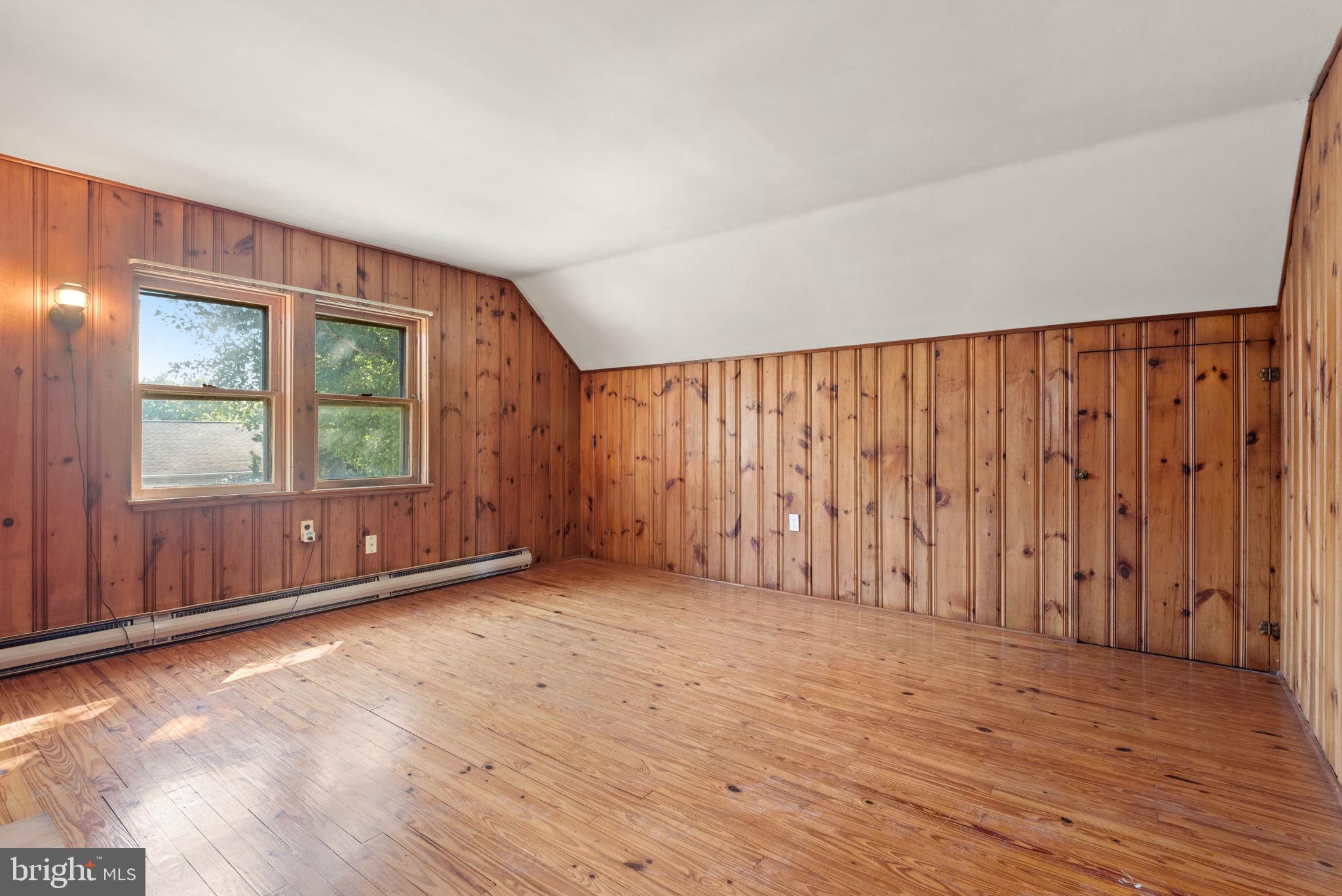 424 Lampeter Road Lancaster, PA 17602 - Photo 25 of 41 wooden floor in an empty room with a window