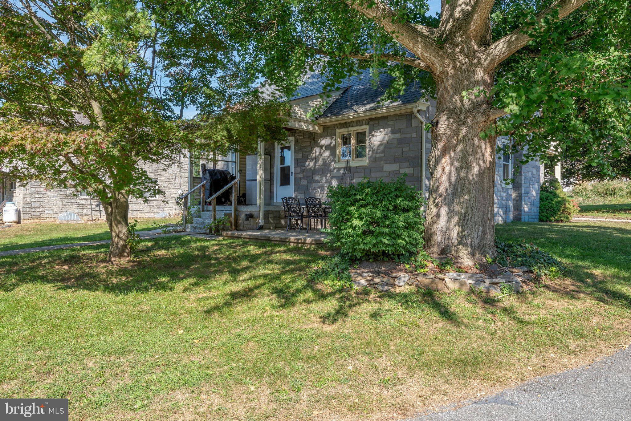 424 Lampeter Road Lancaster, PA 17602 - Photo 30 of 41 a view of a house with a tree in a yard