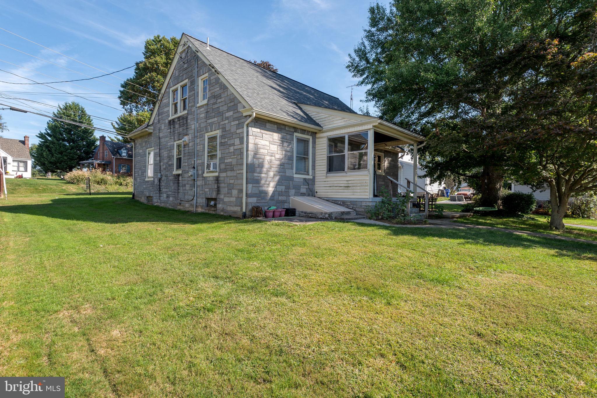 424 Lampeter Road Lancaster, PA 17602 - Photo 31 of 41 a front view of house with yard and green space