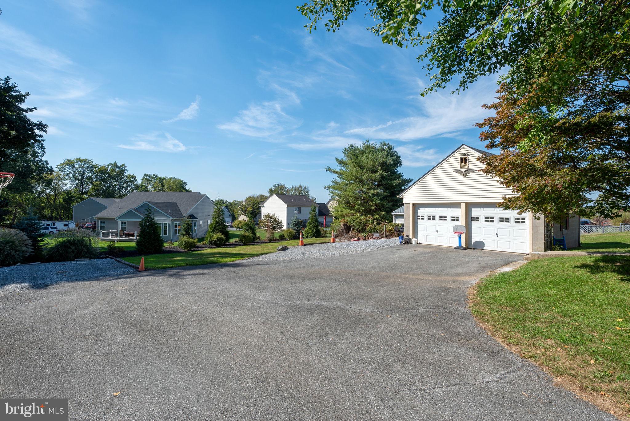 424 Lampeter Road Lancaster, PA 17602 - Photo 33 of 41 a view of a house with a yard and large tree
