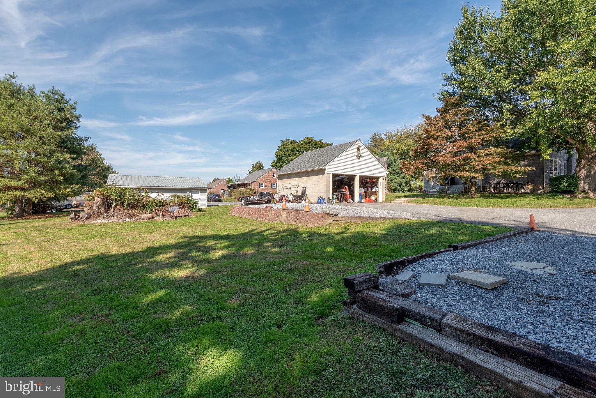 424 Lampeter Road Lancaster, PA 17602 - Photo 34 of 41 a front view of a house with garden