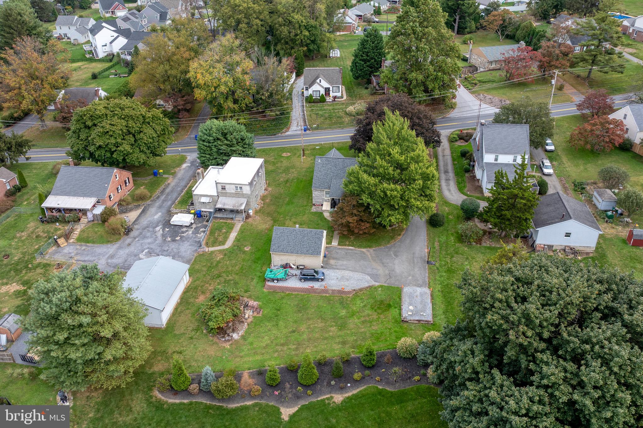 424 Lampeter Road Lancaster, PA 17602 - Photo 37 of 41 an aerial view of a house with garden space and street view