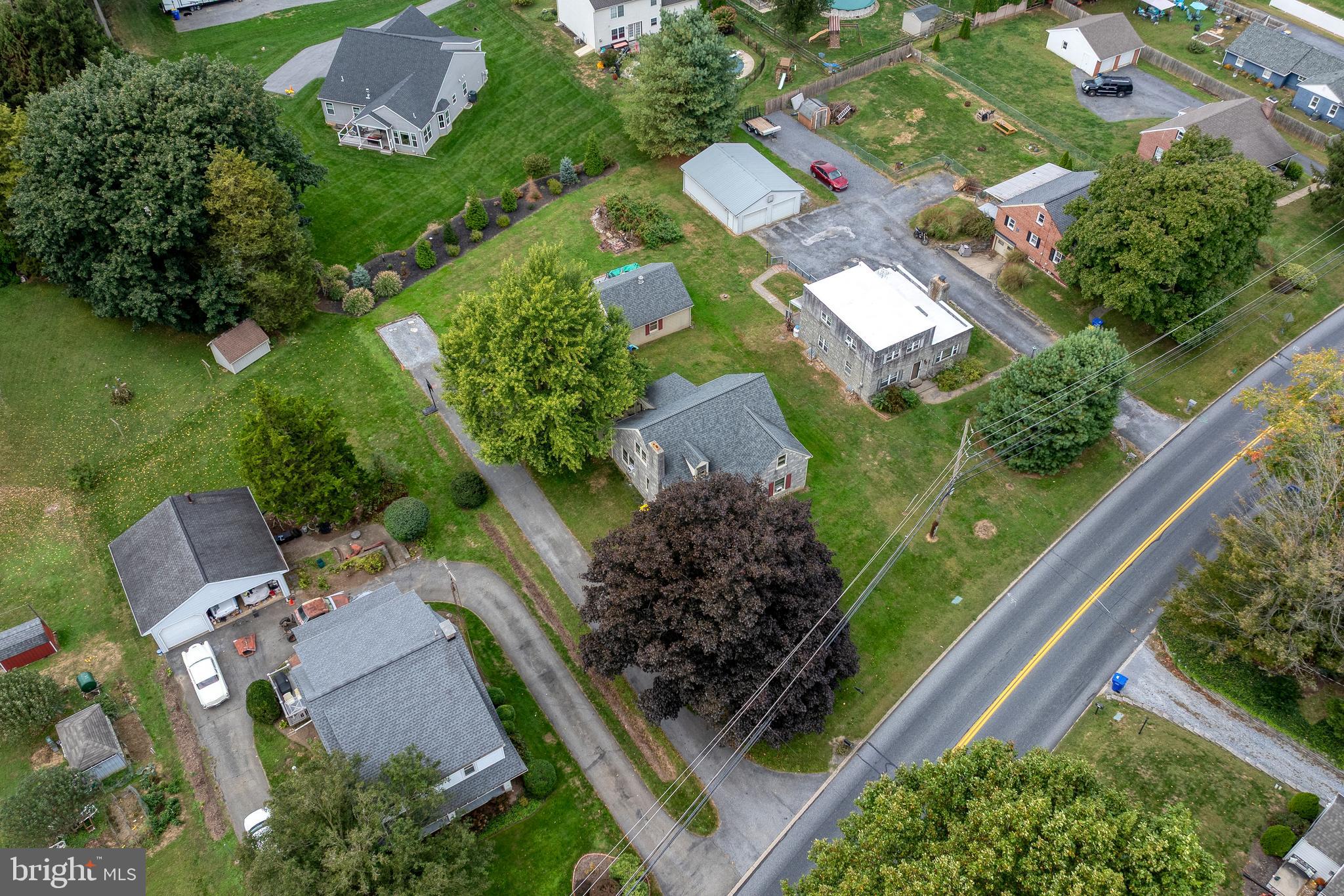 424 Lampeter Road Lancaster, PA 17602 - Photo 40 of 41 an aerial view of a house with a garden