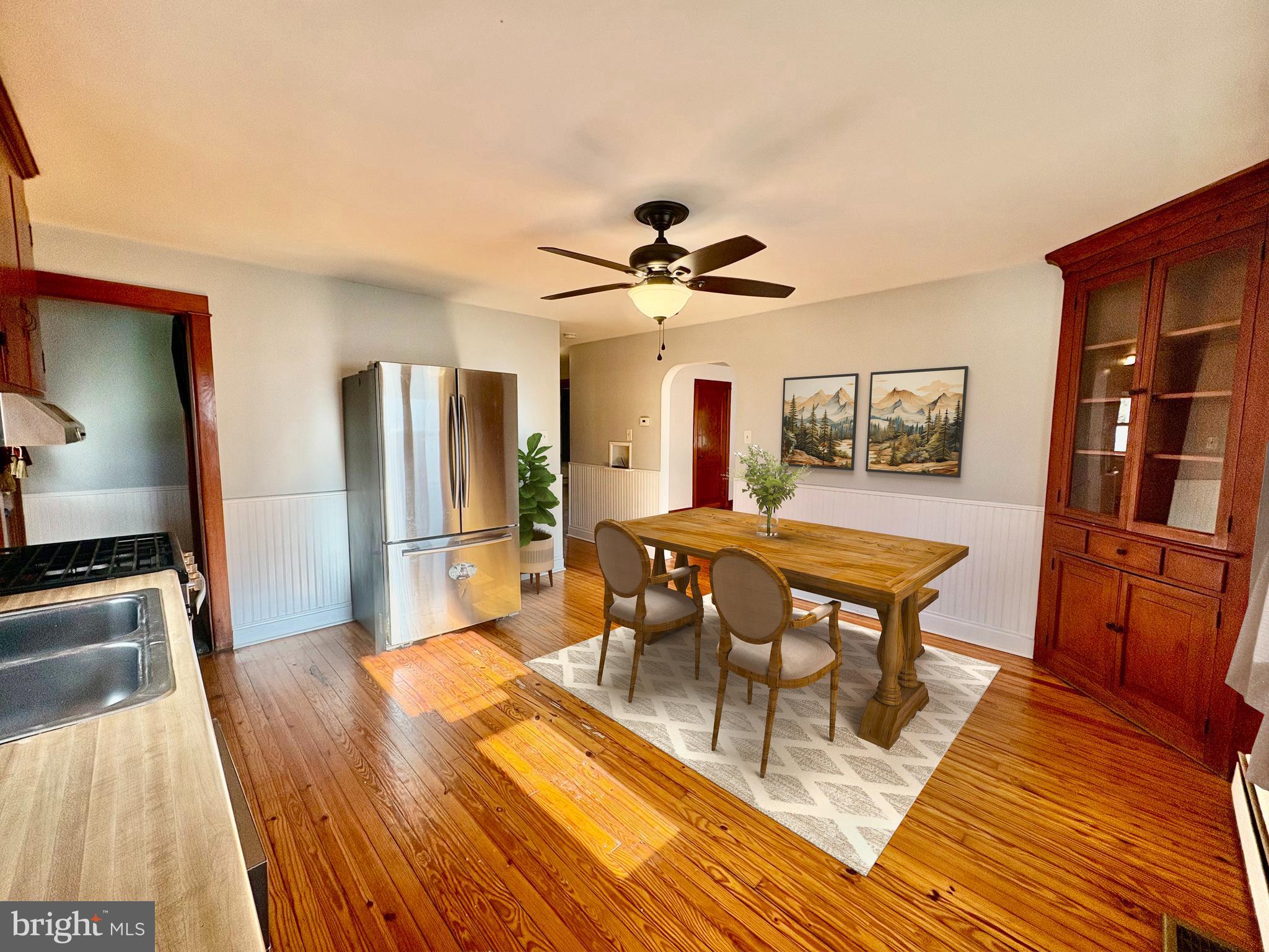 424 Lampeter Road Lancaster, PA 17602 - Photo 4 of 41 a view of a dining room with furniture and wooden floor