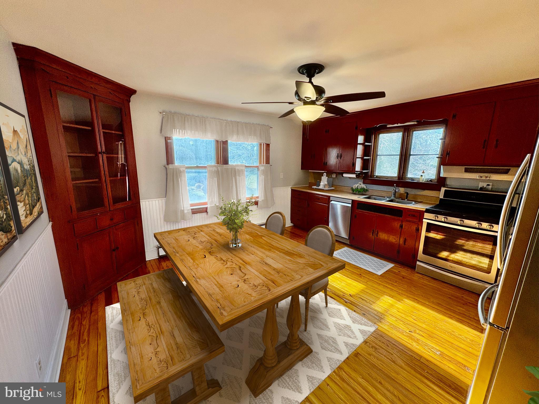 424 Lampeter Road Lancaster, PA 17602 - Photo 5 of 41 a open kitchen with stainless steel appliances granite countertop a stove refrigerator and microwave