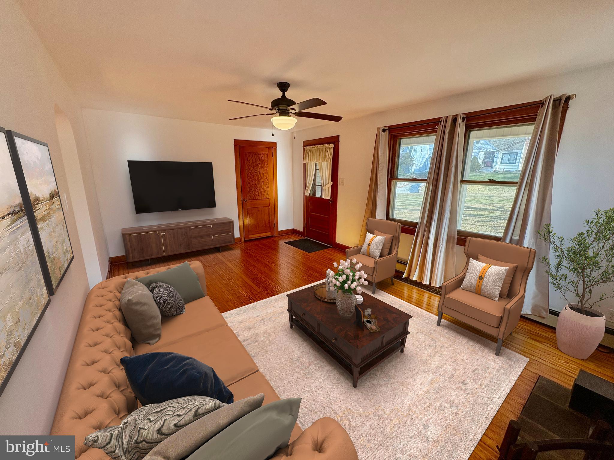 424 Lampeter Road Lancaster, PA 17602 - Photo 10 of 41 a living room with furniture and a flat screen tv