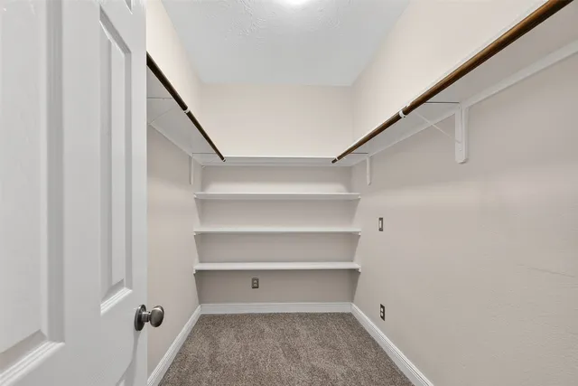 a view of a walk in closet