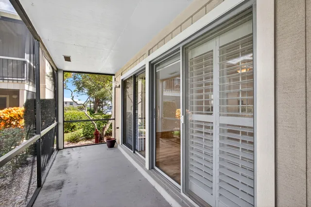 a view of a house with a yard and front view of a house