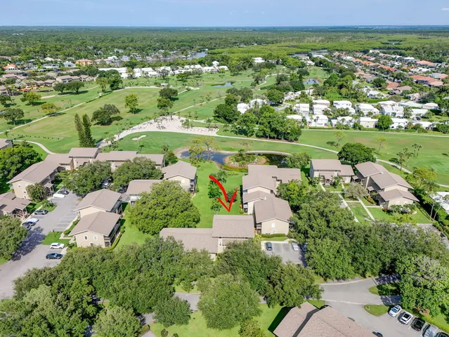 a view of a garden with a swimming pool