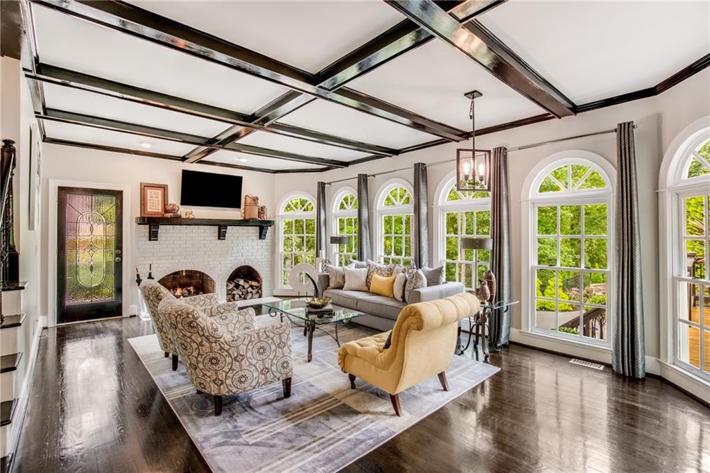 2995 Coles Way Atlanta, GA 30350 - Photo 12 of 44 a living room with furniture fireplace and flat screen tv