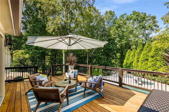 a view of deck with furniture and wooden deck