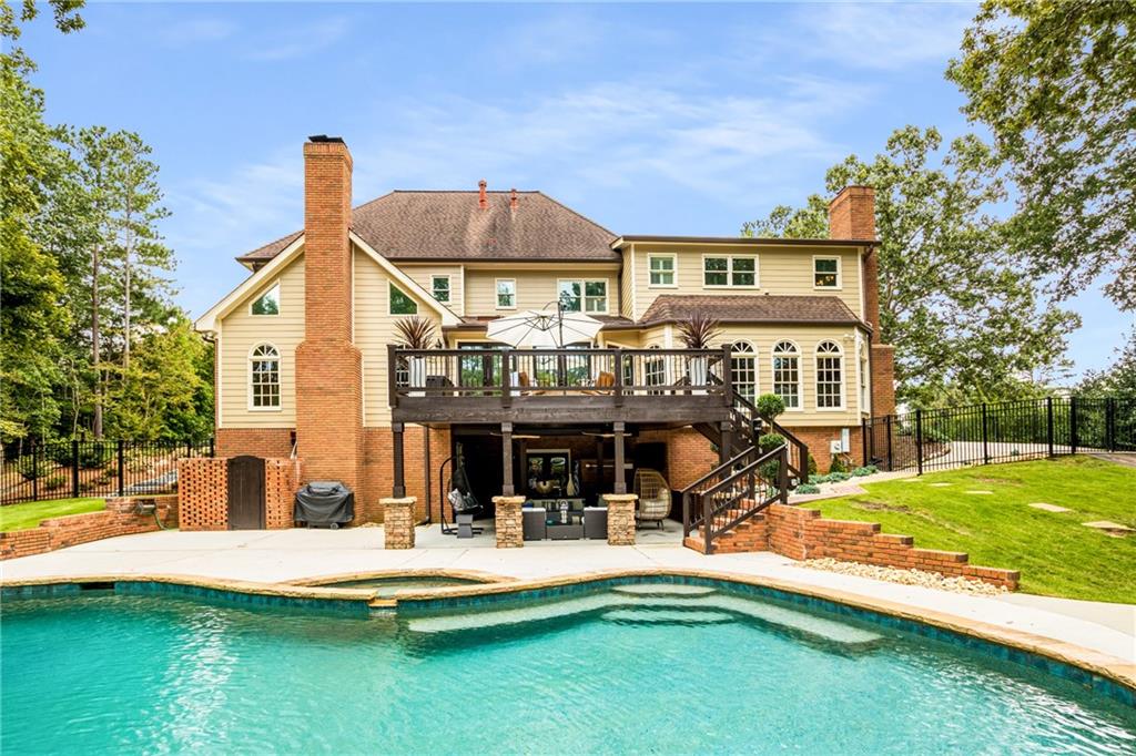 2995 Coles Way Atlanta, GA 30350 - Photo 42 of 44 a view of a house with swimming pool and sitting area
