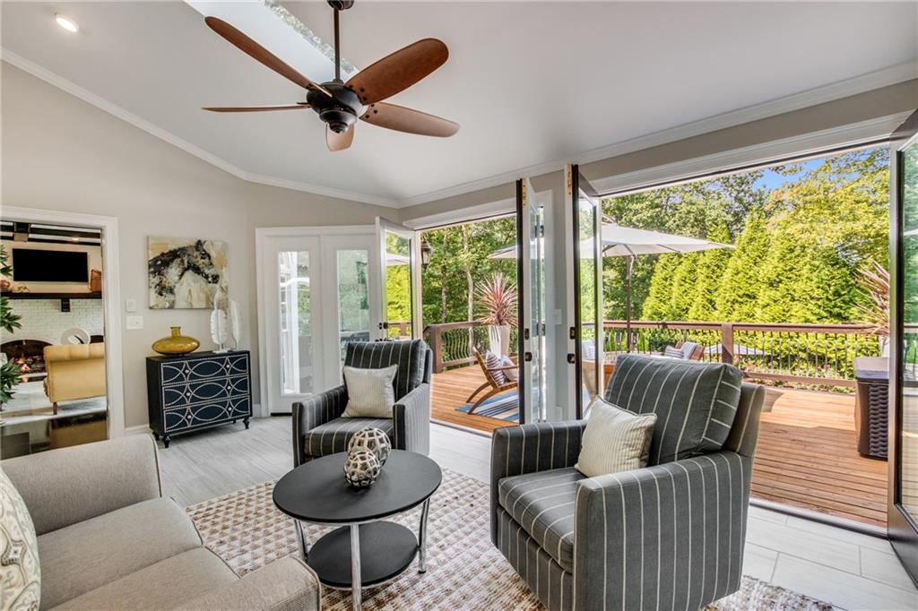2995 Coles Way Atlanta, GA 30350 - Photo 10 of 44 a living room with furniture and a floor to ceiling window