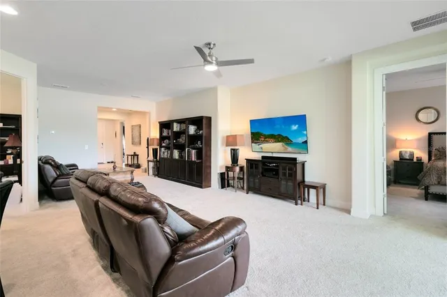 a living room with furniture and a couch