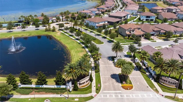 a view of multiple houses with yard