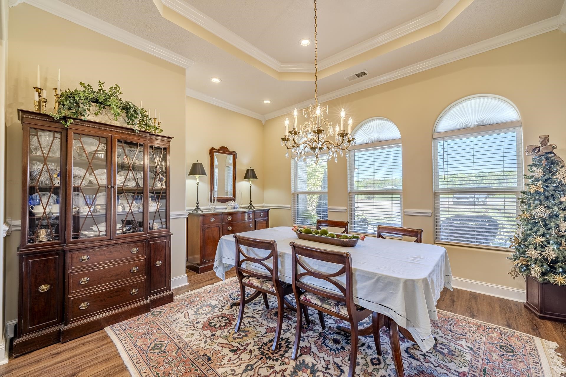 875 Faith Lane Savannah, TN 38372 - Photo 11 of 40 a view of a dining room with furniture window and wooden floor