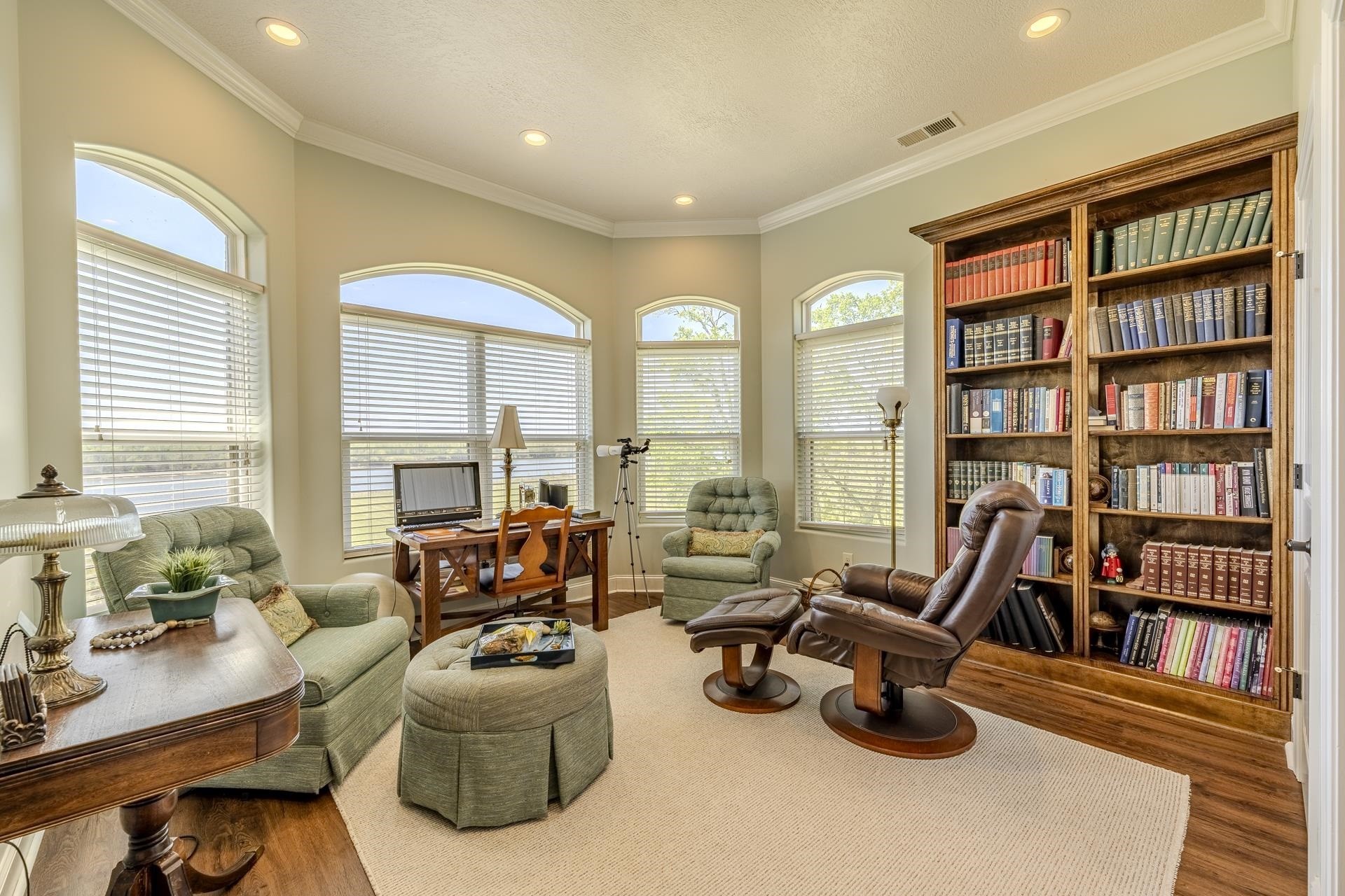 875 Faith Lane Savannah, TN 38372 - Photo 18 of 40 a living room with furniture flat screen and a bookshelf