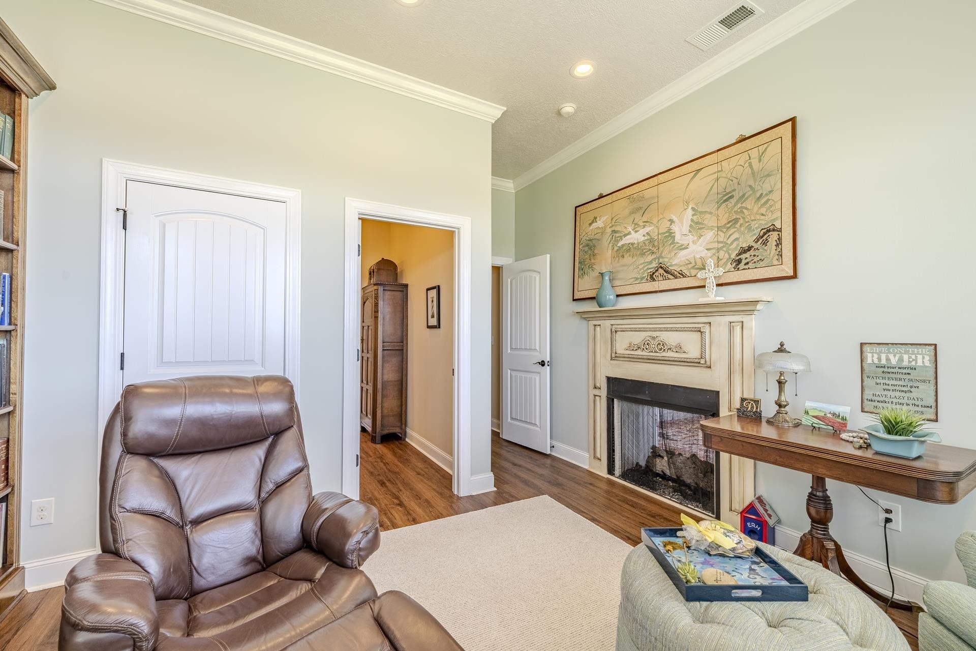 875 Faith Lane Savannah, TN 38372 - Photo 20 of 40 a room with furniture and a fireplace