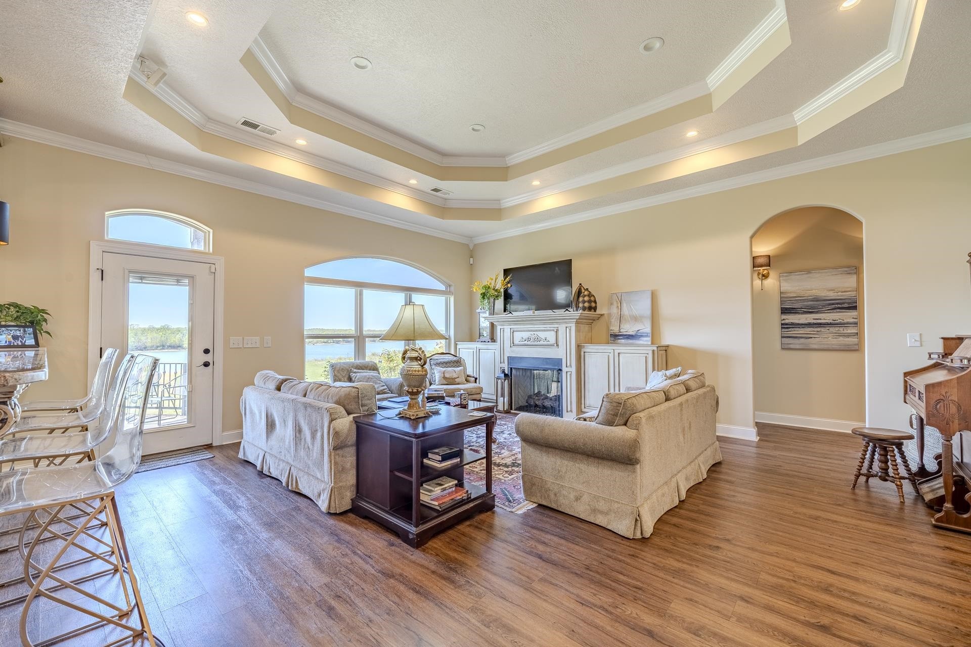 875 Faith Lane Savannah, TN 38372 - Photo 7 of 40 a living room with fireplace furniture and a wooden floor