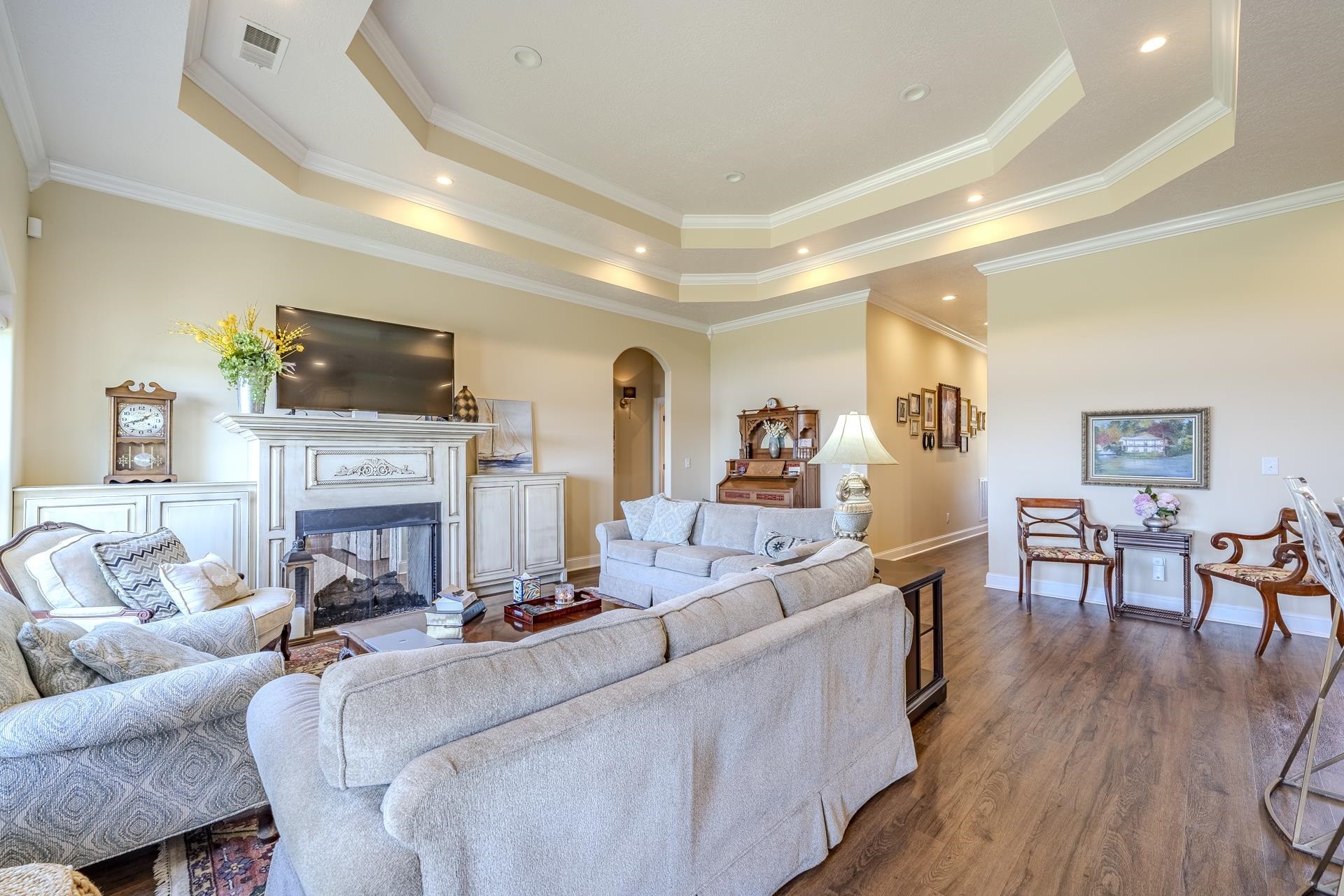 875 Faith Lane Savannah, TN 38372 - Photo 8 of 40 a living room with furniture a fireplace and wooden floor