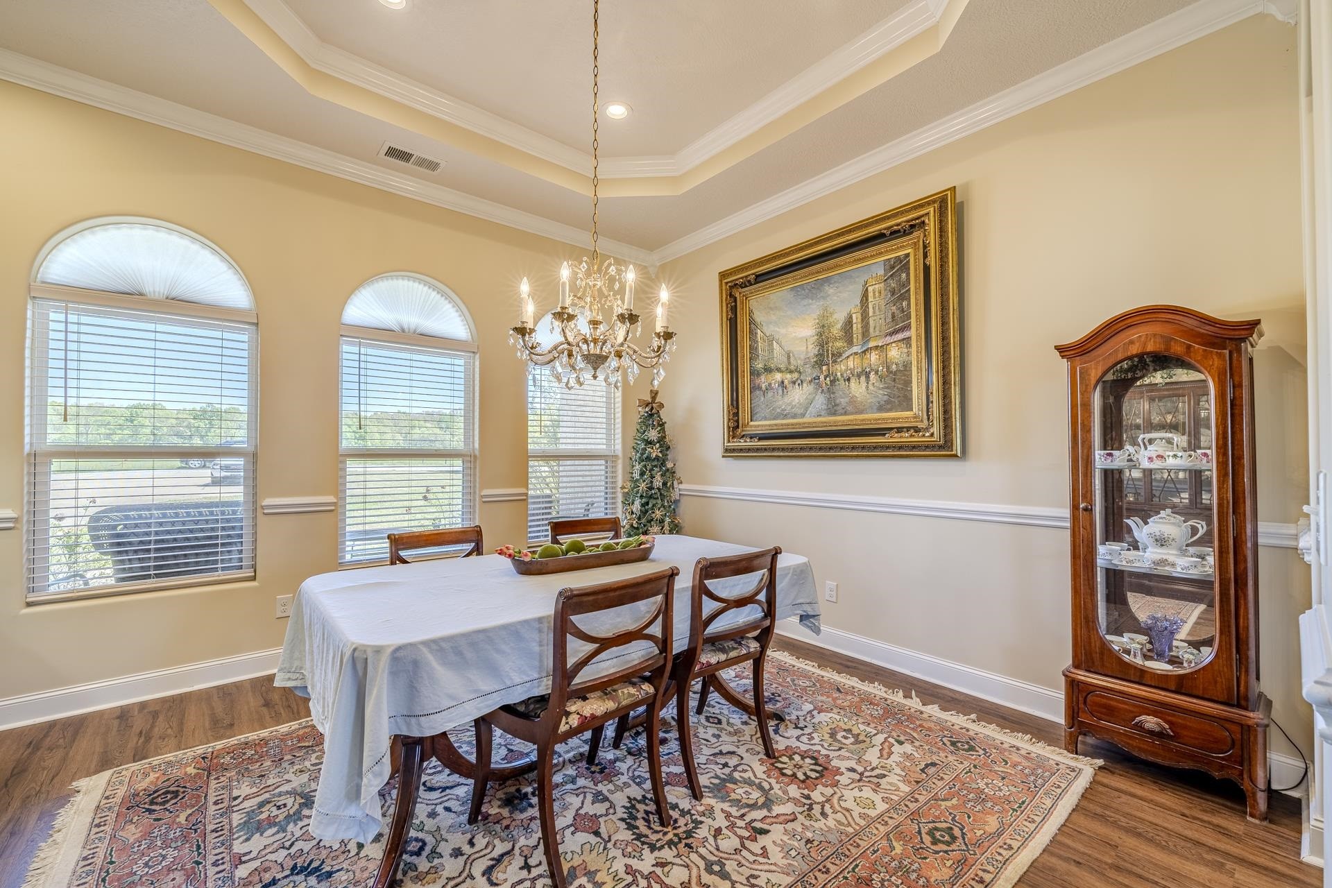 875 Faith Lane Savannah, TN 38372 - Photo 10 of 40 a view of a dining room with furniture wooden floor and chandelier