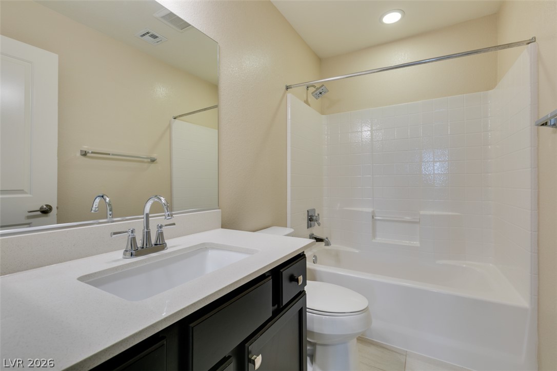 2549 Sable Ridge Street Henderson, NV 89044 - Photo 39 of 48 Bright, clean bath with modern fixtures and a vanity offering ample counter space.