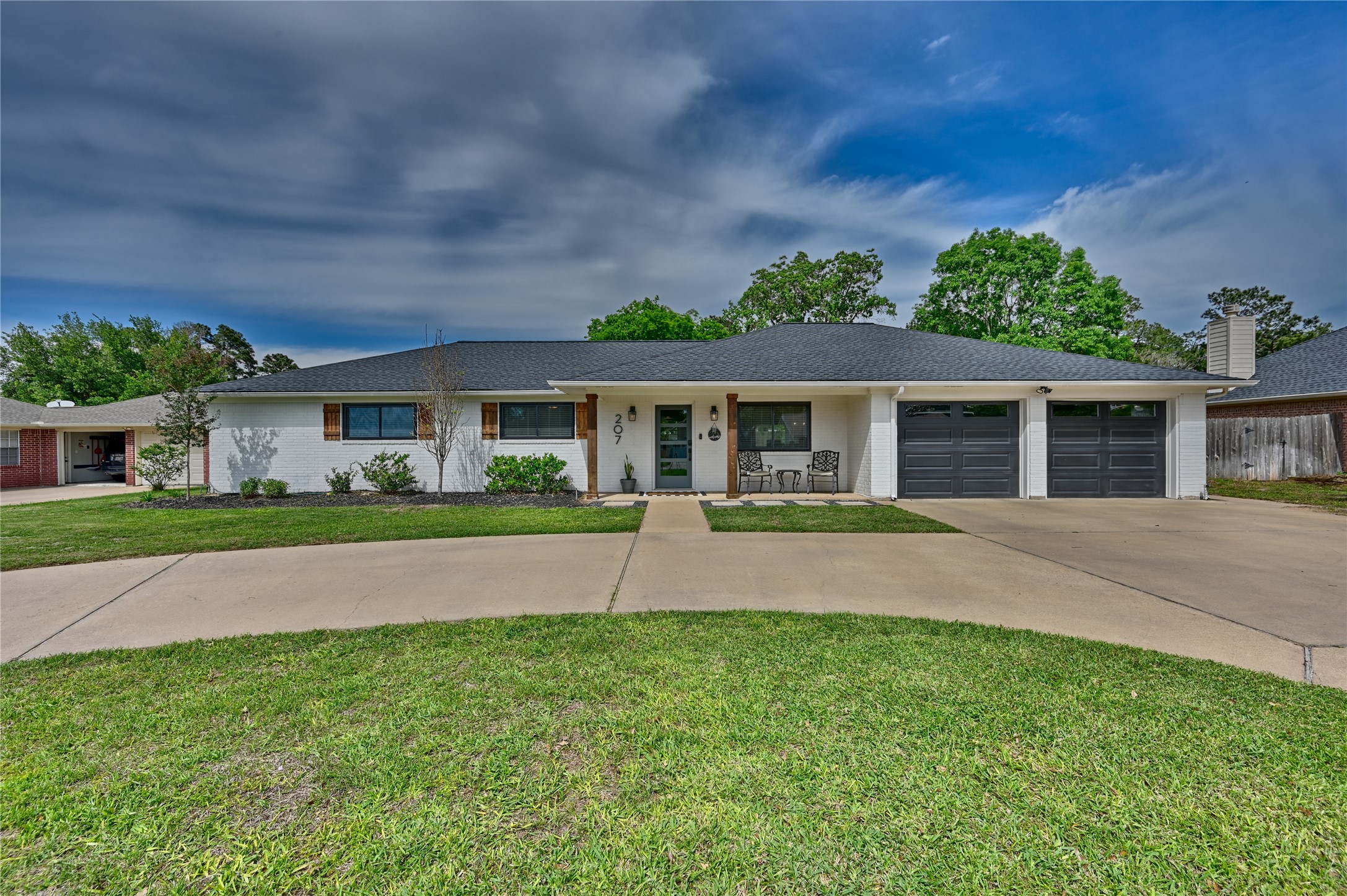 front view of house with a yard