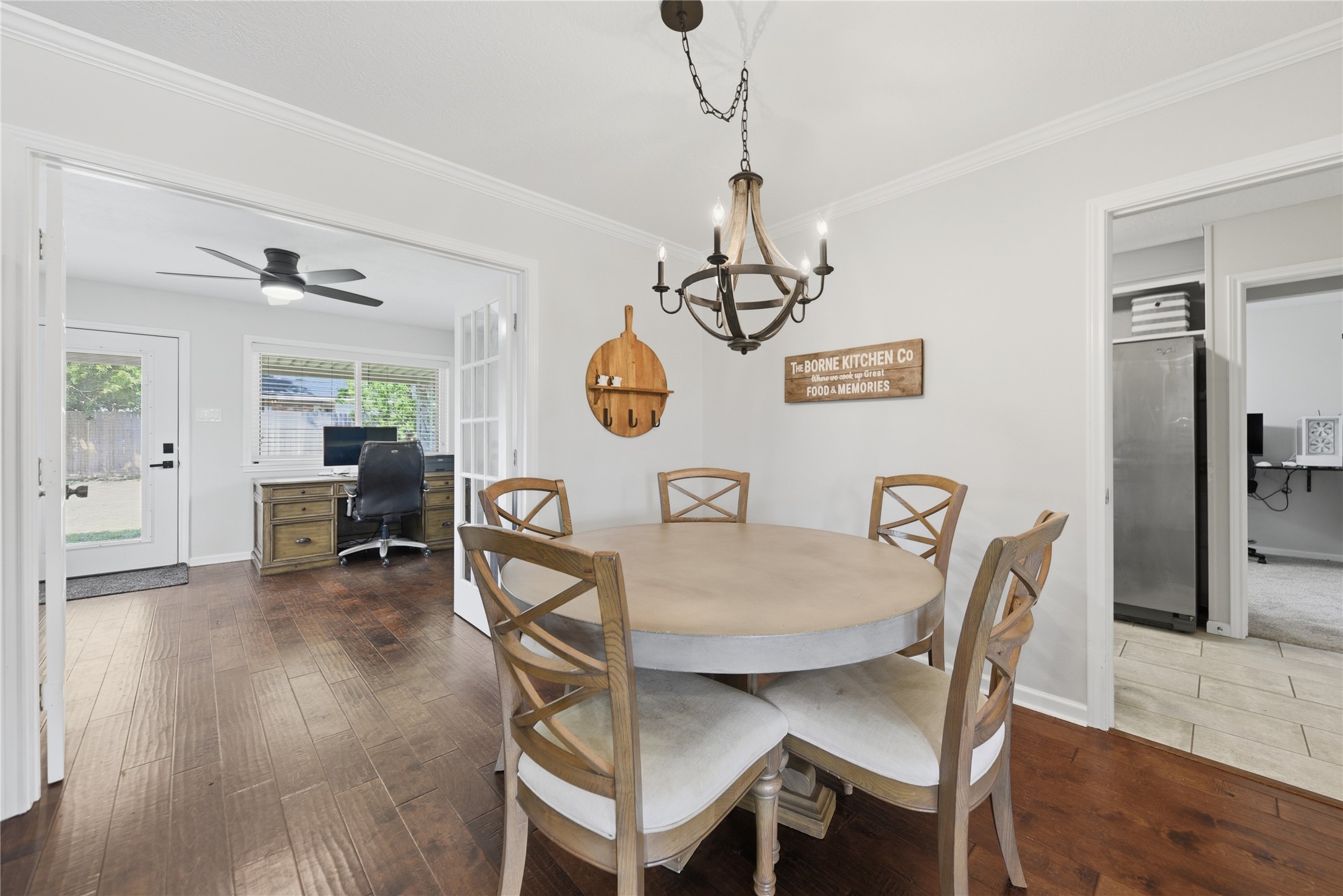 207 Briar Ridge Drive Bellville, TX 77418 - Photo 15 of 36 a view of a dining room with furniture and wooden floor