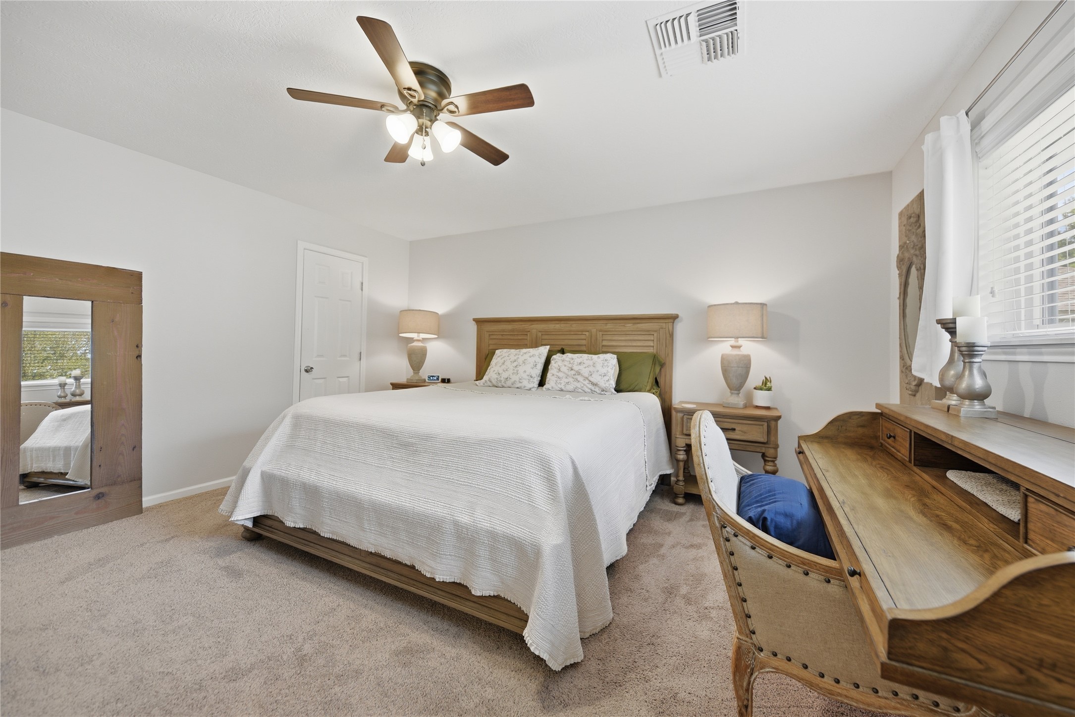 207 Briar Ridge Drive Bellville, TX 77418 - Photo 17 of 36 a bedroom with bed and window
