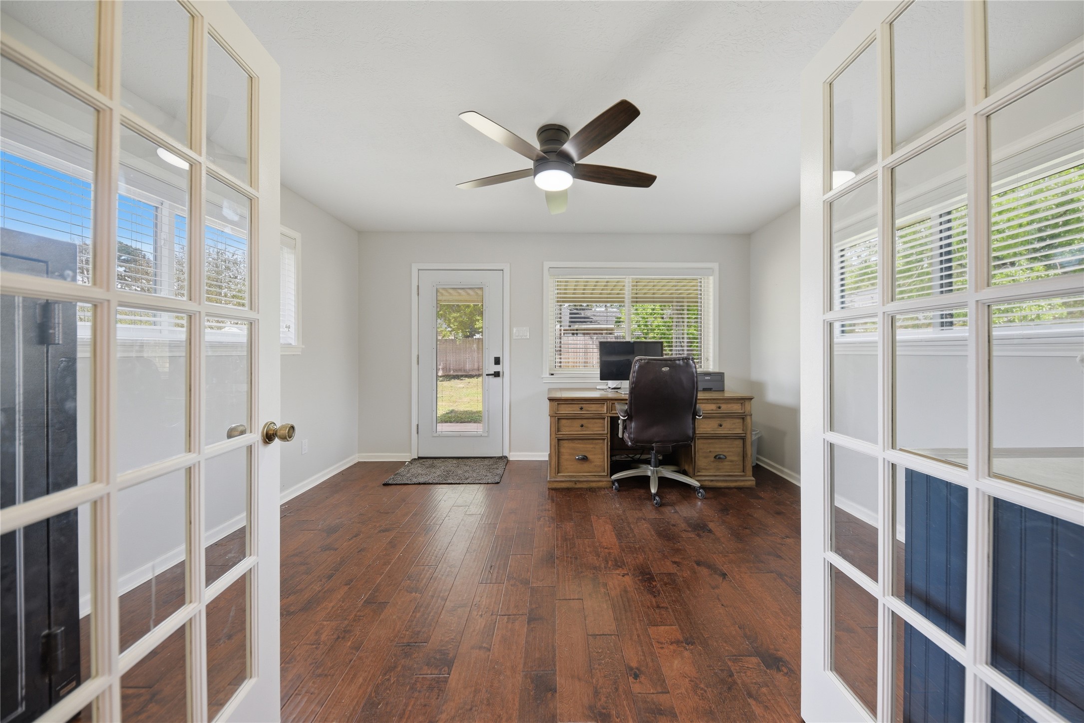 207 Briar Ridge Drive Bellville, TX 77418 - Photo 33 of 36 a view of a workspace with furniture and a window