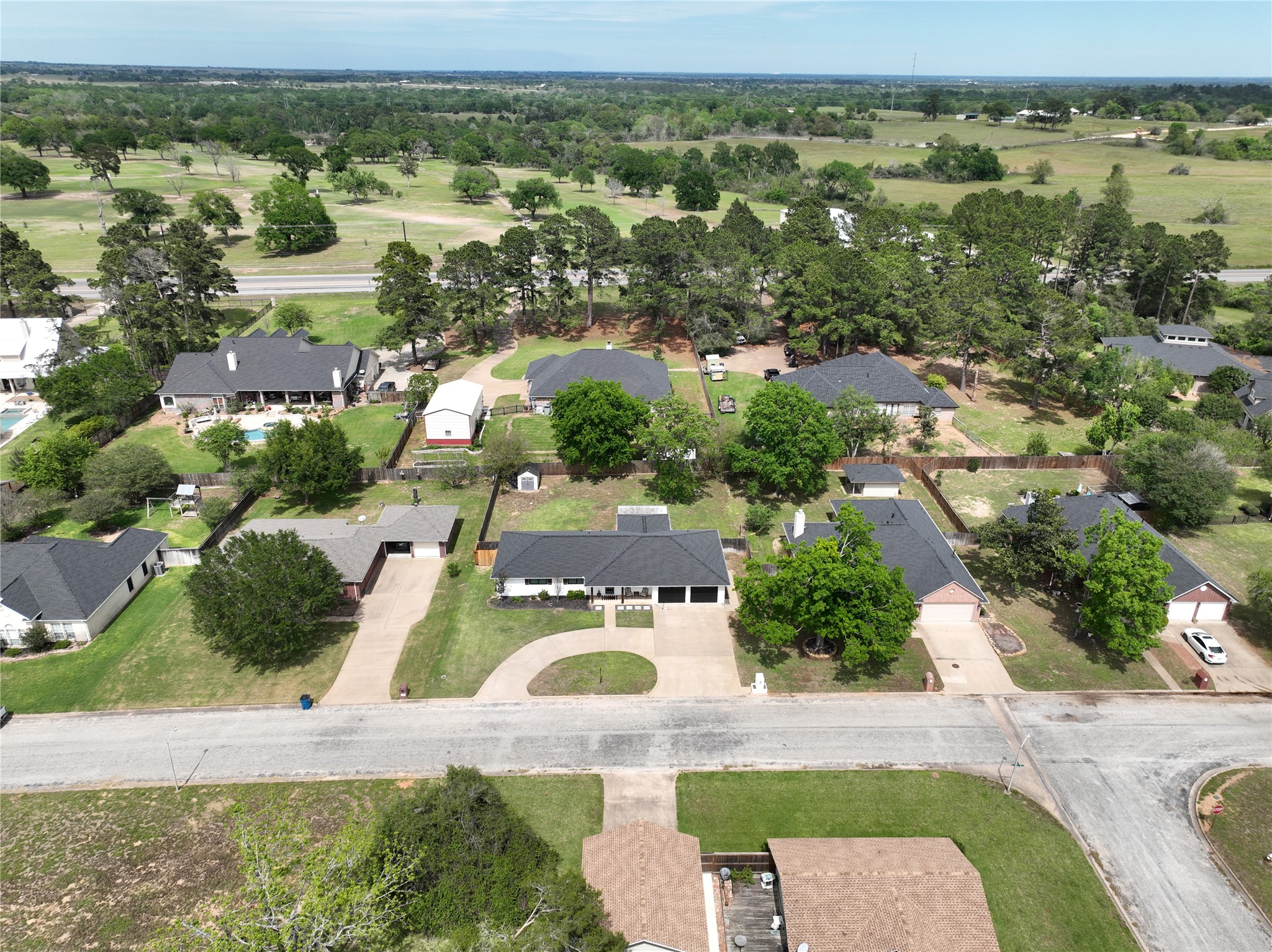 207 Briar Ridge Drive Bellville, TX 77418 - Photo 34 of 36 an aerial view of residential houses with outdoor space