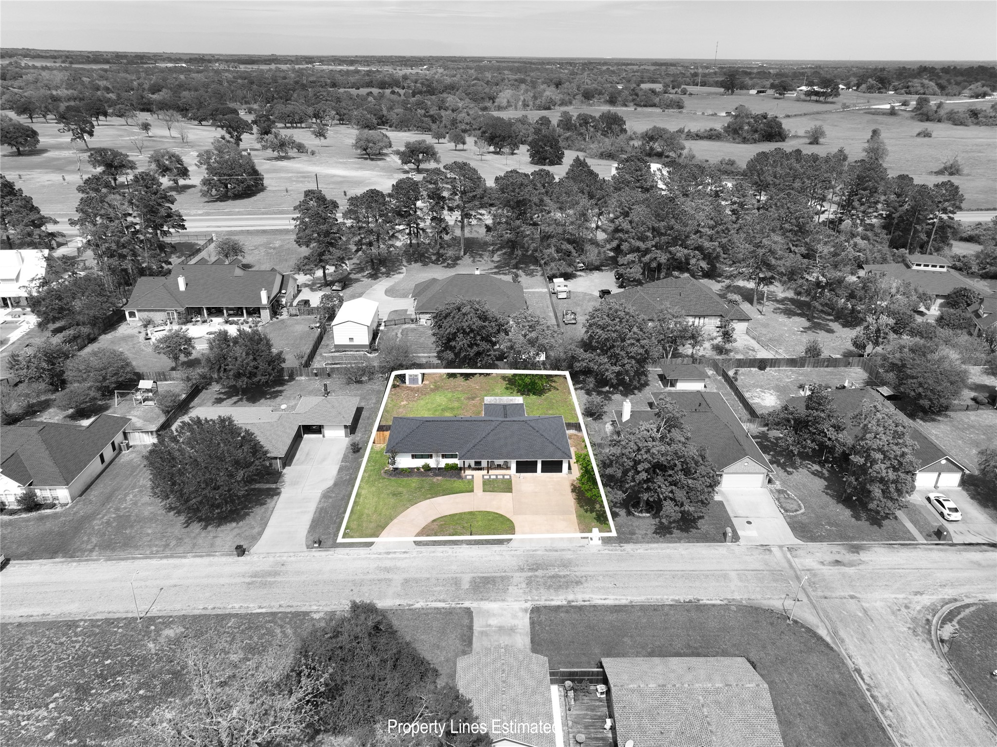 207 Briar Ridge Drive Bellville, TX 77418 - Photo 35 of 36 an aerial view of a house with a swimming pool and lake view