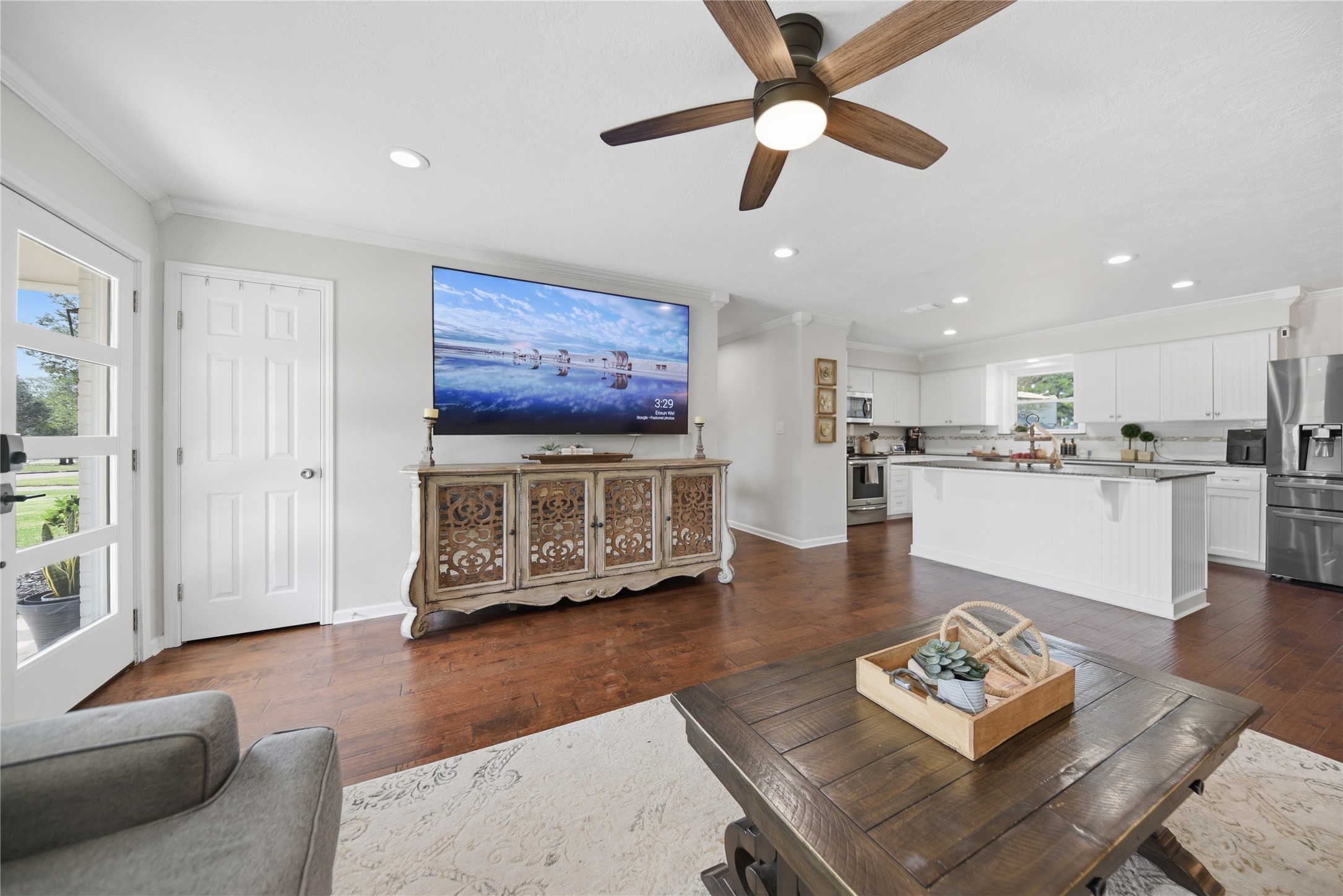 207 Briar Ridge Drive Bellville, TX 77418 - Photo 7 of 36 a living room with furniture and a view of kitchen