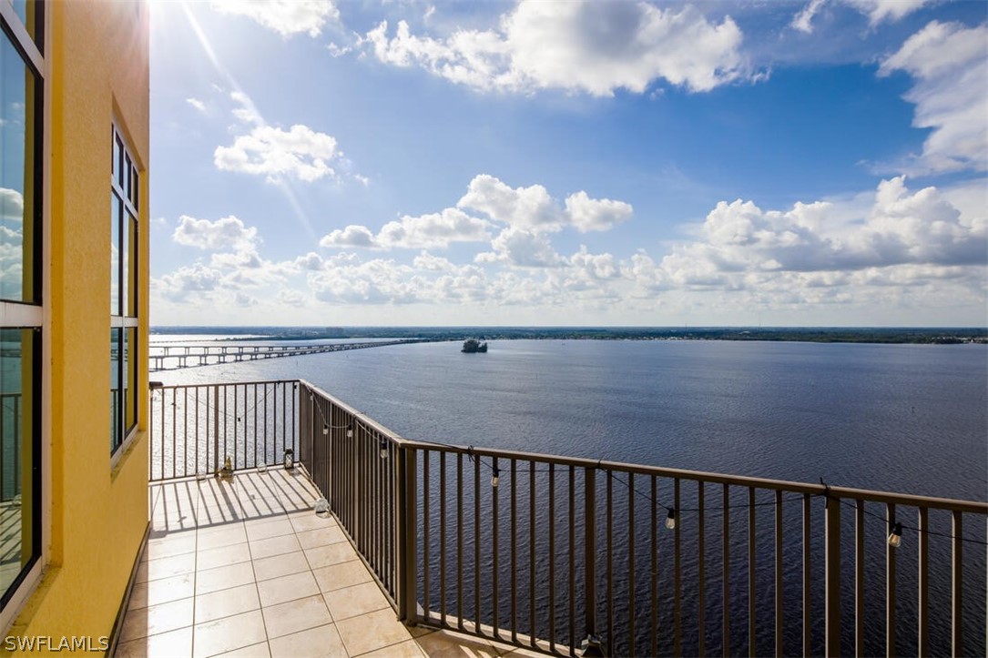 2797 First Street, Unit 2101 Fort Myers, FL 33916 - Photo 2 of 26 a view of a balcony with wooden floor