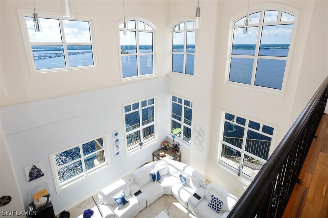 2797 First Street, Unit 2101 Fort Myers, FL 33916 - Photo 9 of 26 front view of a house with large windows