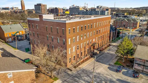 a view of a city with tall buildings