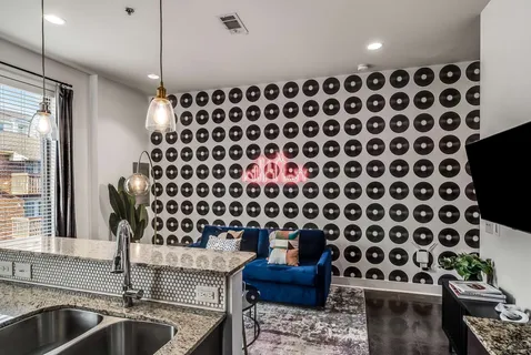 a kitchen with a sink and a refrigerator