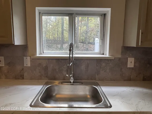 a close view of sink and tap